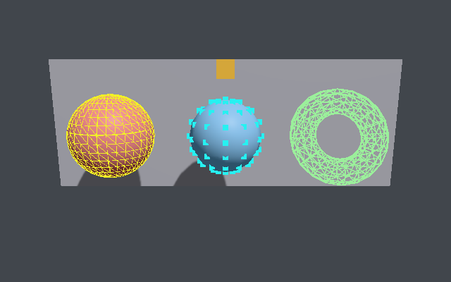 A sphere with a yellow wireframe, a sphere with a cyan dot on every vertex, a torus drawn as wireframe only, and a box behind the wall drawn over it
